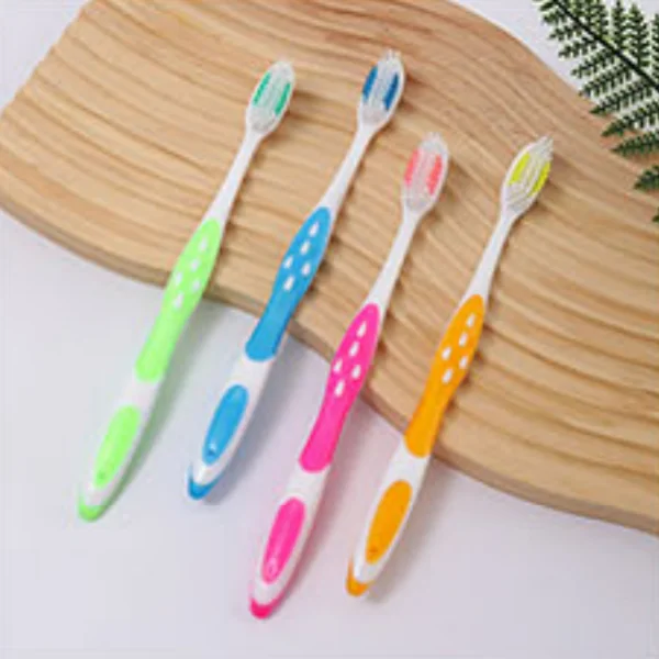 Droplet Grip Cross-Action Dual-Injection Toothbrush